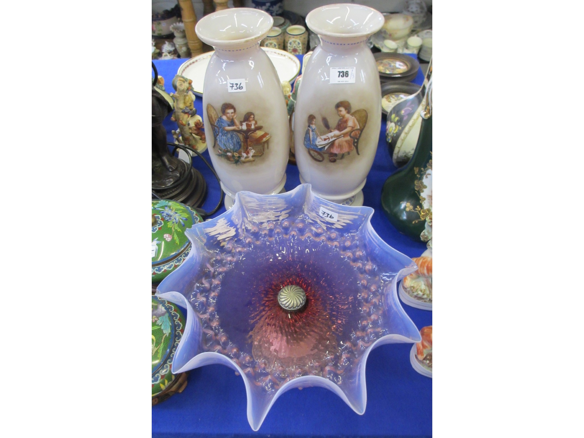 Appraisal: Pair of Victorian glass vases with decoration of children and