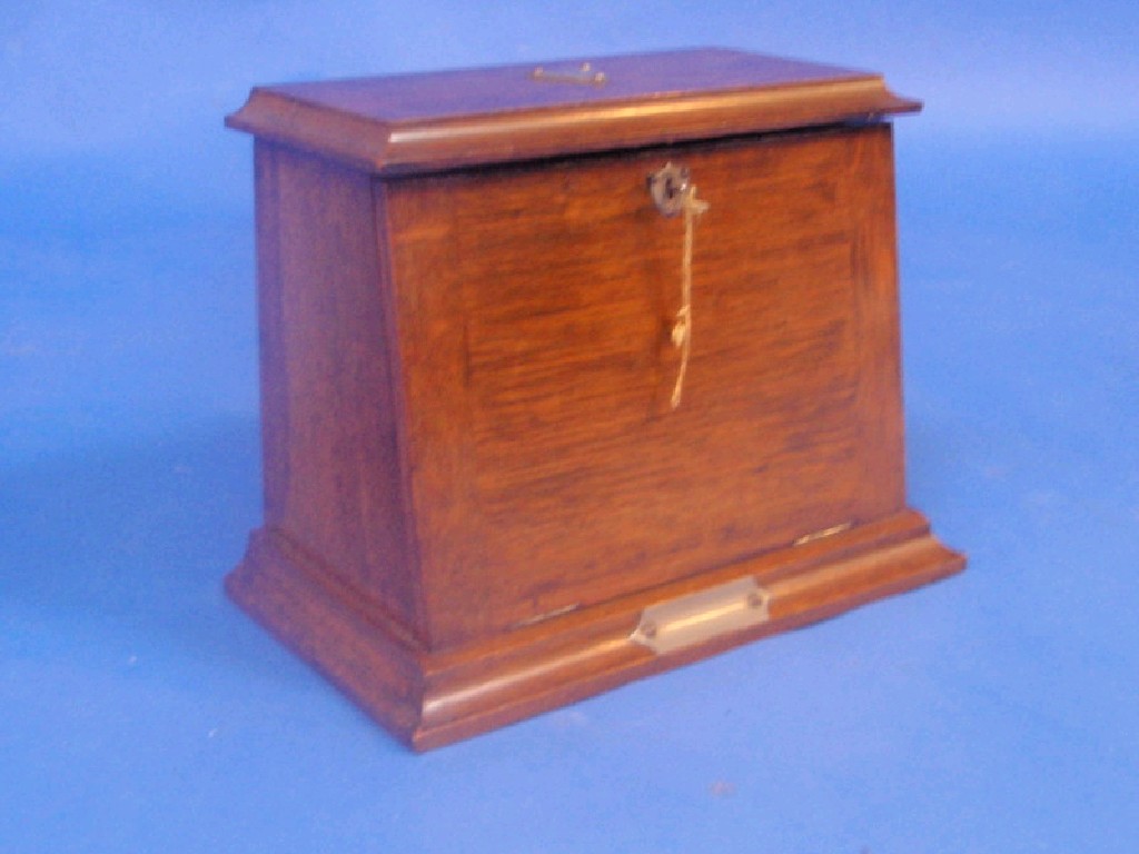 Appraisal: An Edwardian oak stationery box