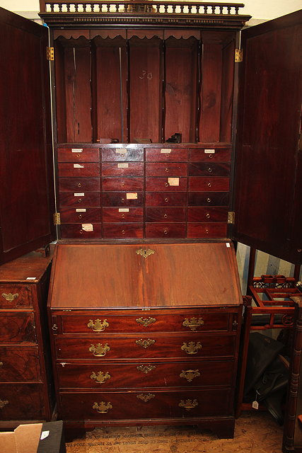 Appraisal: A MID TH CENTURY MAHOGANY CABINET with two mirrored doors