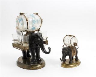 Appraisal: A Cast Metal and Brass Elephant Form Decanter Set Height