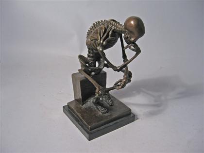 Appraisal: BRONZE SKELETON THE THINKER On black marble plinth H in