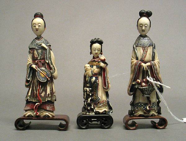 Appraisal: A group of three Japanese export painted ivory snuff bottles