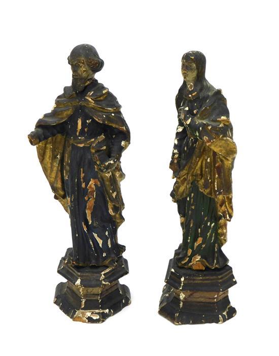 Appraisal: Pair of th C Continental santos hand-carved with polychrome decoration