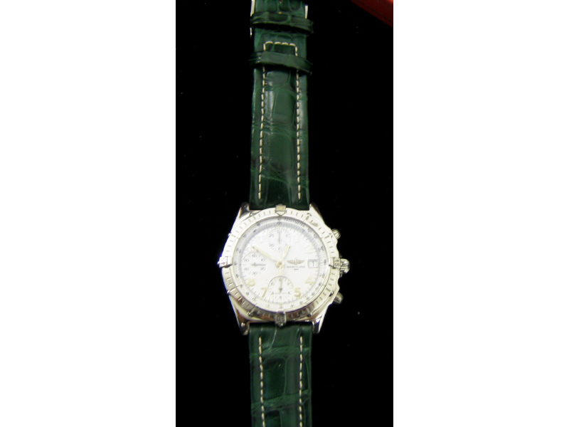 Appraisal: MAN'S BREITLING Chronograph stainless steel with green leather strap Estimate