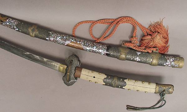 Appraisal: A Japanese ceremonial sword th Century The blade engraved with