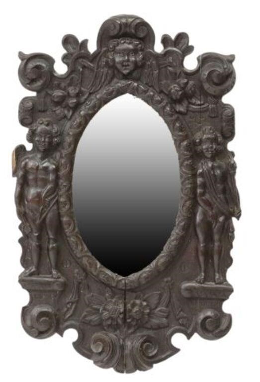 Appraisal: English carved oak mirror th c winged cherub mask crest