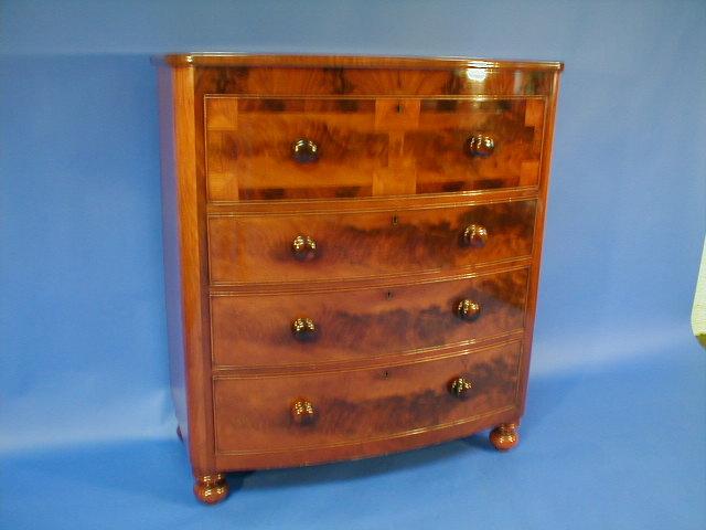 Appraisal: A Victorian flamed mahogany bow front chest of four drawers