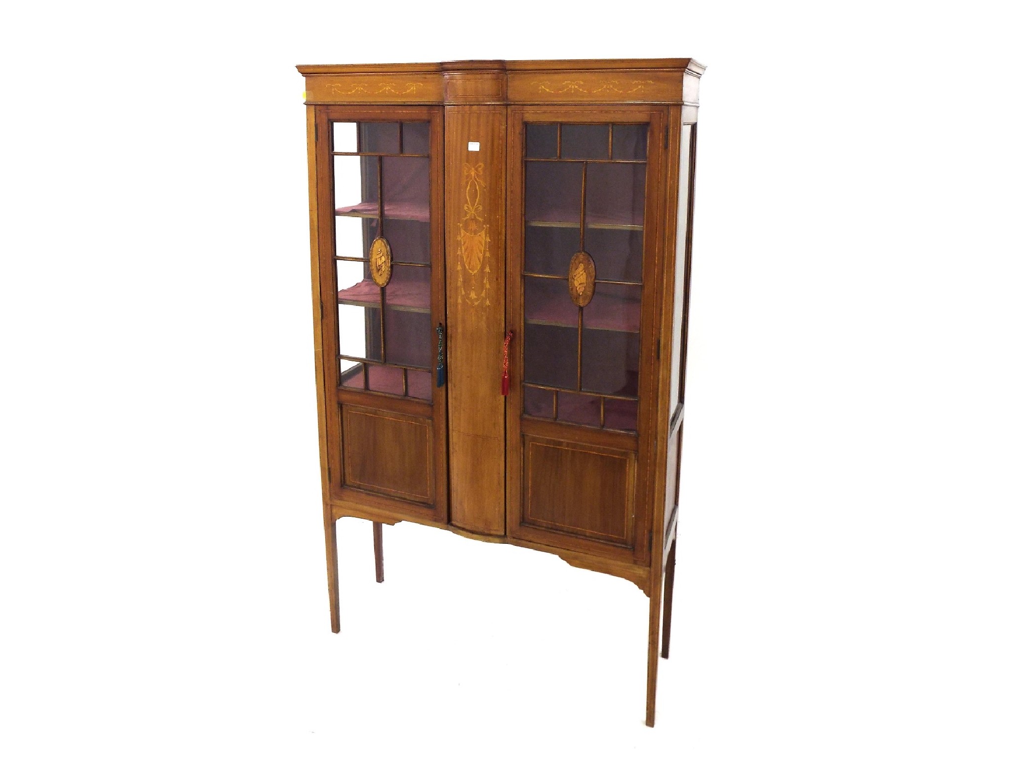 Appraisal: Edwardian mahogany display cabinet in the Sheraton manner the twin