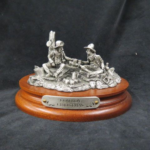 Appraisal: Chilmark Pewter Figurine Cowboy Christmas by Polland plus wood base