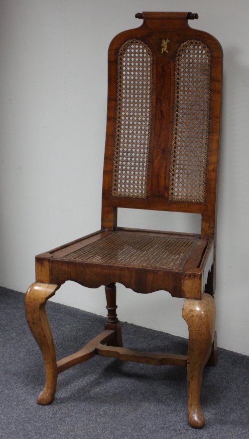 Appraisal: An Italian walnut and marquetry cane back chair circa on