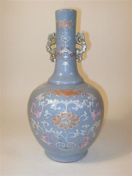 Appraisal: Chinese molded and blue glazed porcelain vaseqianlong mark th century