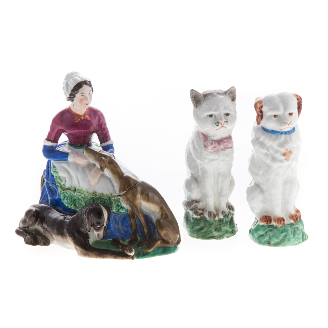 Appraisal: Three Continental ceramic figures including cat and dog in H