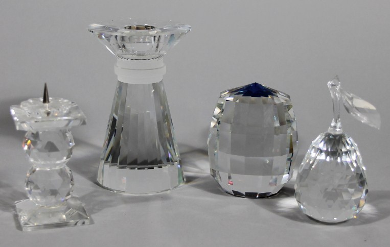 Appraisal: Various Swarovski ornaments comprising vase cm high candlestick coloured paperweight