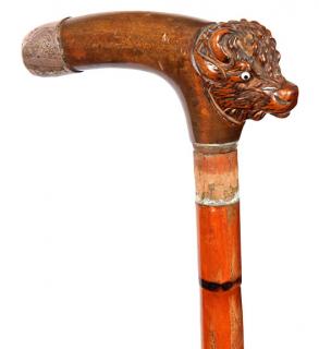 Appraisal: Buffalo Suitcase Cane- Ca - A carved burl handle which