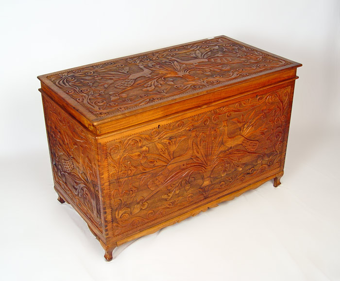 Appraisal: CARVED CAMPHOR BLANKET CHEST Peacocks in a flowing flower motif