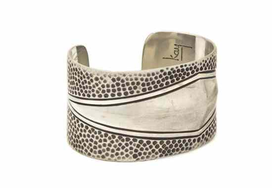 Appraisal: A Sterling Silver Bracelet with dimple stamping design Stamped with