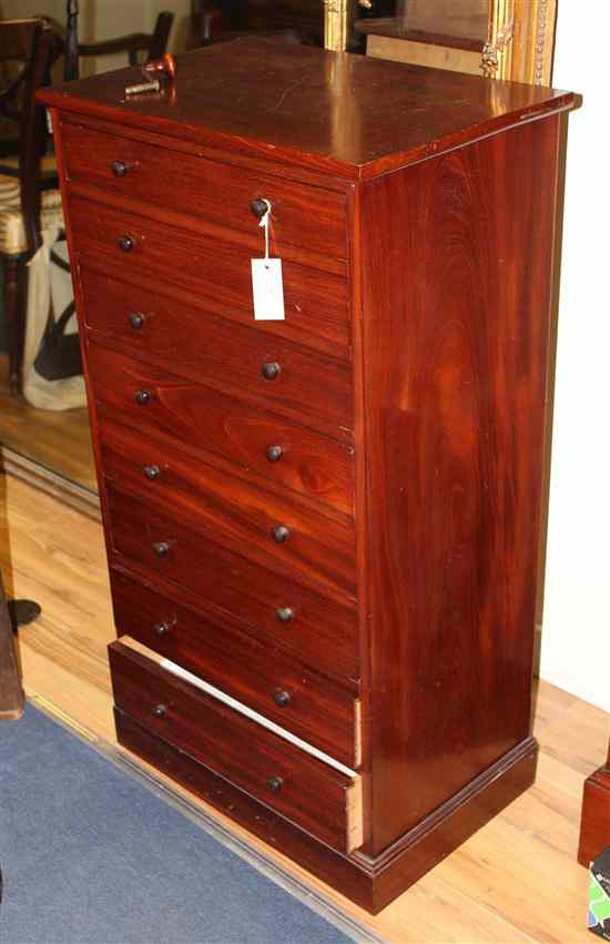 Appraisal: A mahogany eight drawer collectors chest with knob handles ft