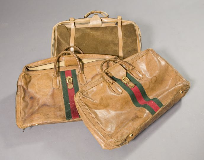 Appraisal: Group of Three Gucci Soft-Sided Leather Suitcases consisting of two