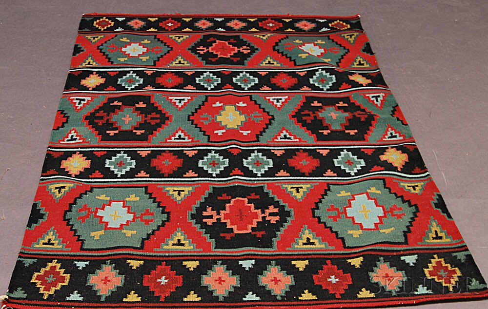 Appraisal: Flatweave Area Rug depicting geometric motifs in reds greens blues