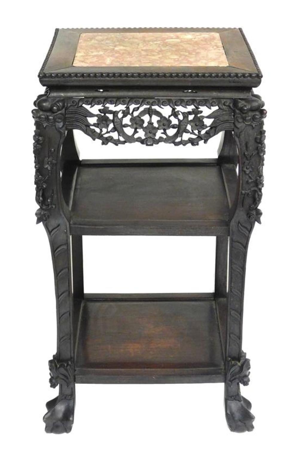 Appraisal: ASIAN Marble top three-tier stand Chinese th C ornately carved