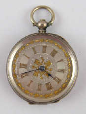 Appraisal: A white metal tests silver cased key wind pocket watch