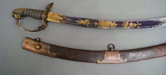 Appraisal: A British Infantry sword inch curved blue and gilt blade