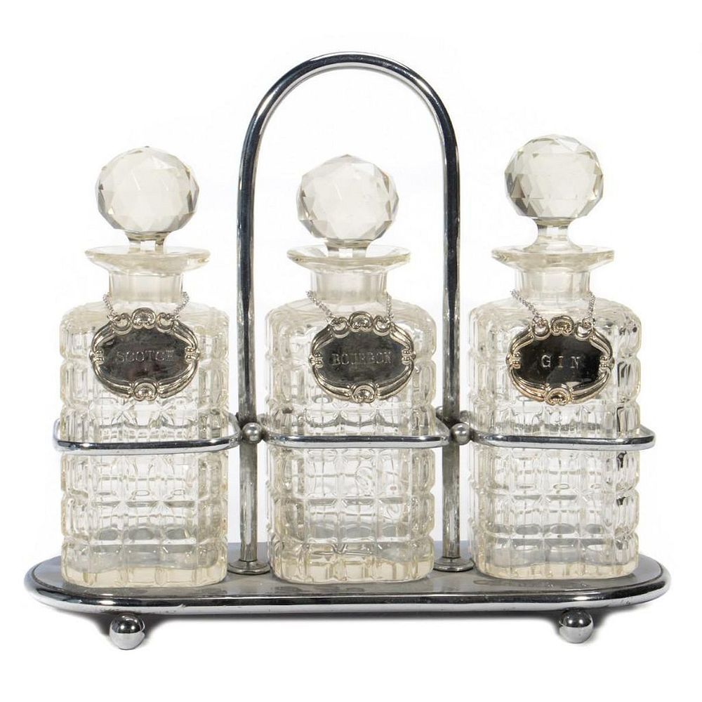 Appraisal: A Victorian Style Cut Glass Suite of Liquor Bottles The