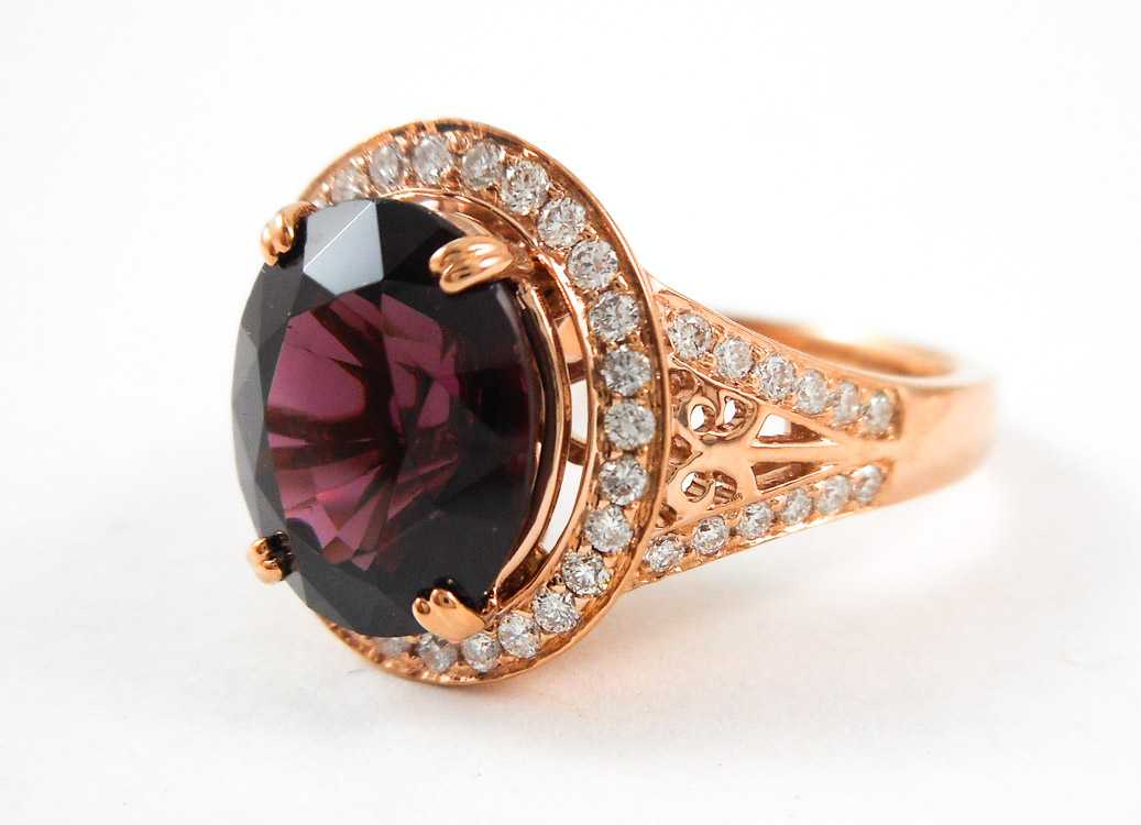 Appraisal: SPINEL DIAMOND AND FOURTEEN KARAT GOLD RING The rose gold