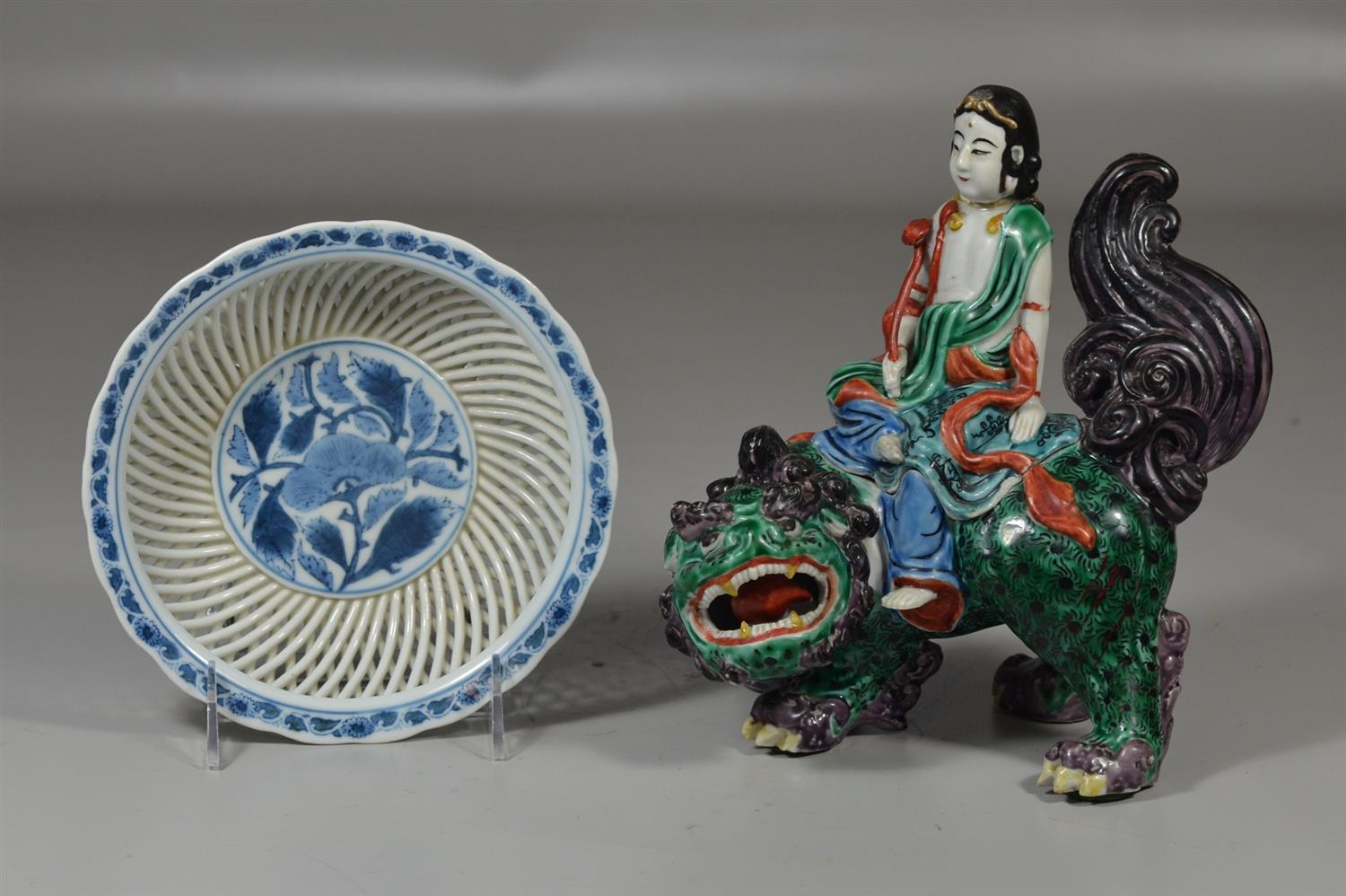 Appraisal: Pieces of Japanese porcelain including Kutani figure astride a foo