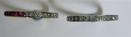 Appraisal: A ruby and diamond full eternity ring channel set two