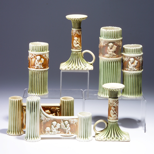 Appraisal: Seven ROSEVILLE Donatello pieces to include three cylindrical vases a