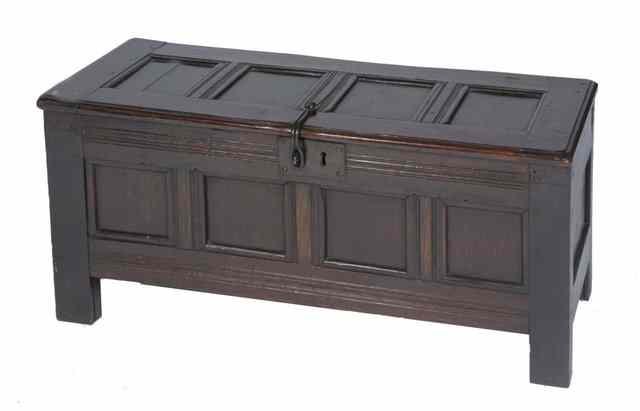 Appraisal: AN ANTIQUE OAK SMALL COFFER with panelled front and top