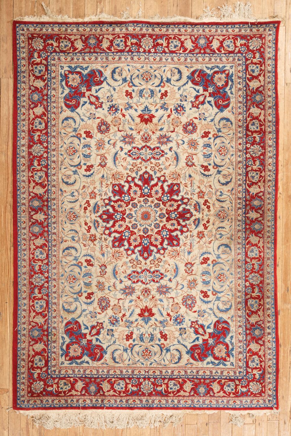 Appraisal: Persian Carpet cream ground central medallion and foliate design in