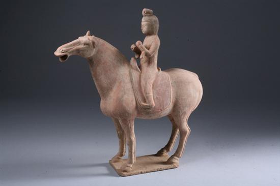 Appraisal: CHINESE POTTERY FIGURE OF HORSE AND RIDER Tang Dynasty -