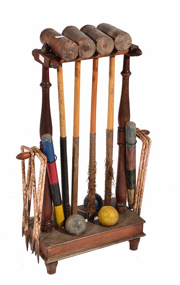 Appraisal: AN ANTIQUE MAHOGANY CROQUET SET ON STAND consisting of four