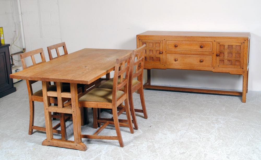 Appraisal: AN OAK DINING SUITE c in the Arts and Crafts