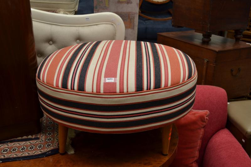 Appraisal: A MIDCENTURY OTTOMAN IN MODERN STRIPED UPHOLSTERY A MIDCENTURY OTTOMAN