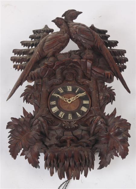 Appraisal: A good th century carved walnut Black Forest cuckoo clock