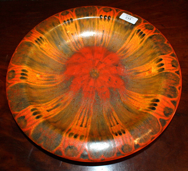 Appraisal: A ROYAL LANCASTRIAN FLAME GLAZE CIRCULAR CHARGER with wide rim