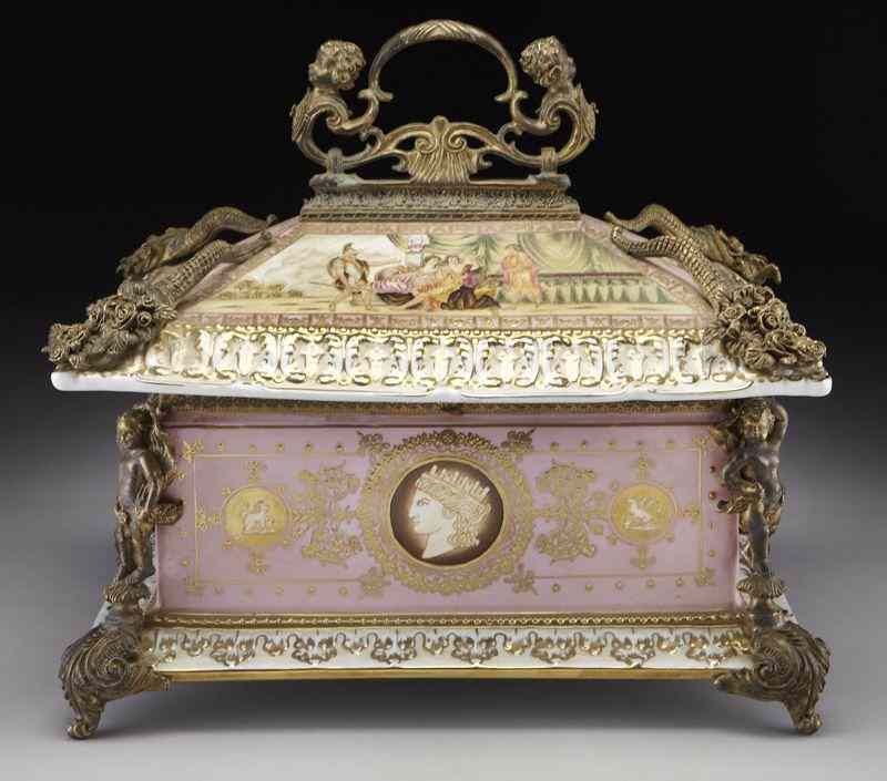 Appraisal: Vienna style bronze and porcelain jewel casketthe rectangular casket surmounted