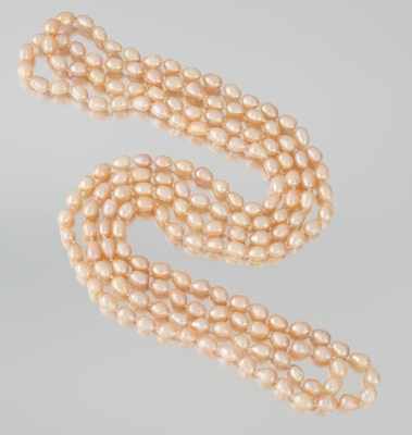 Appraisal: A Rope Length Peach Color Pearl Necklace One long rope