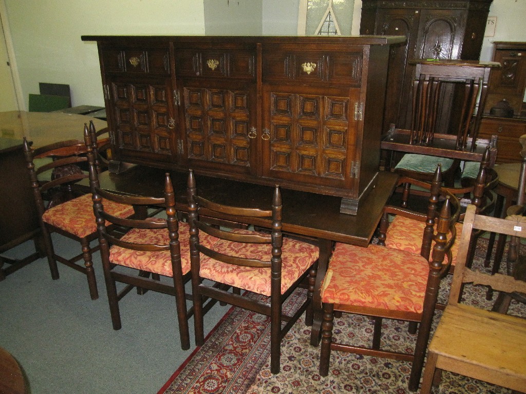 Appraisal: Lot comprising oak sideboard dining table and eight chairs