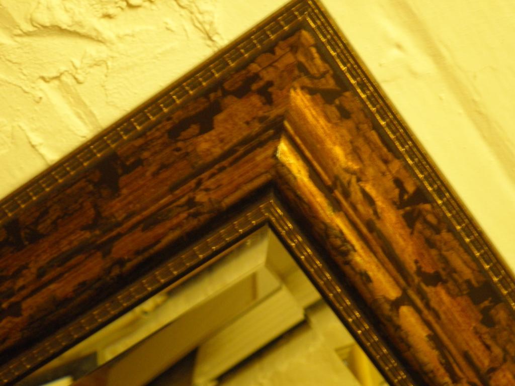 Appraisal: An ornate gilt framed bevelled edge mirror cm x cm