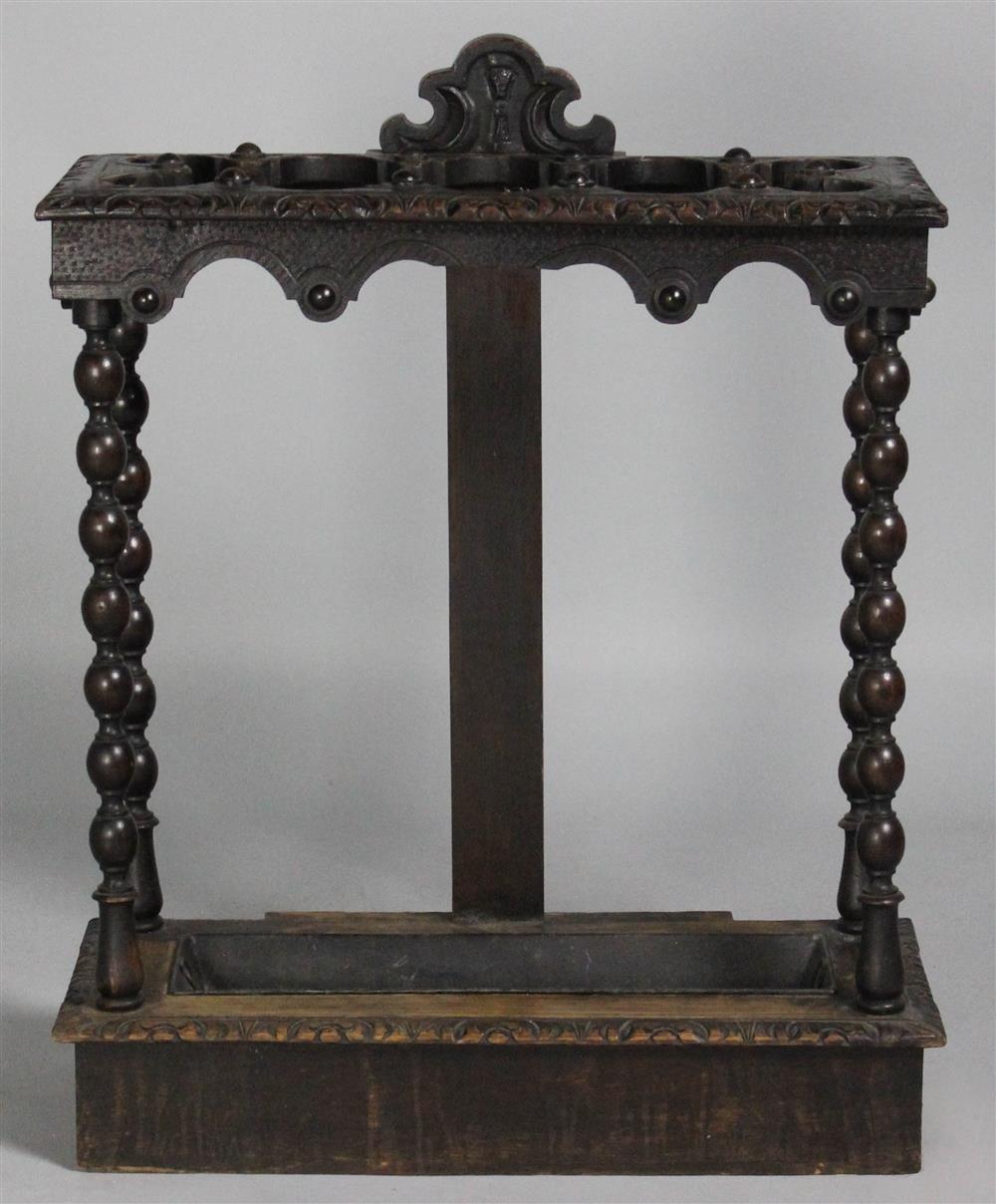 Appraisal: VICTORIAN ENGLISH CARVED OAK UMBRELLA STAND the rectangular top with