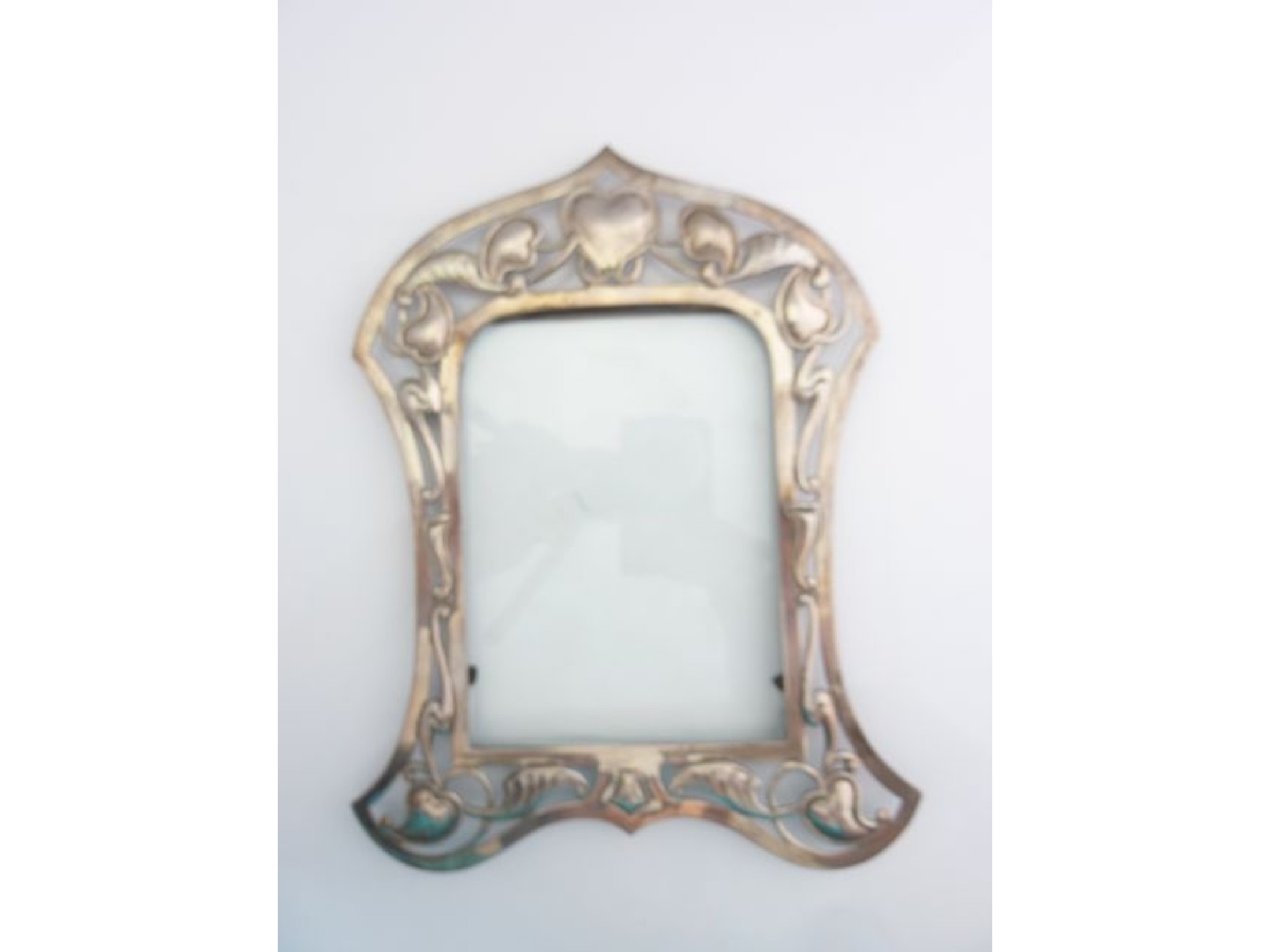 Appraisal: A George V silver Arts Crafts style picture frame Lawrence