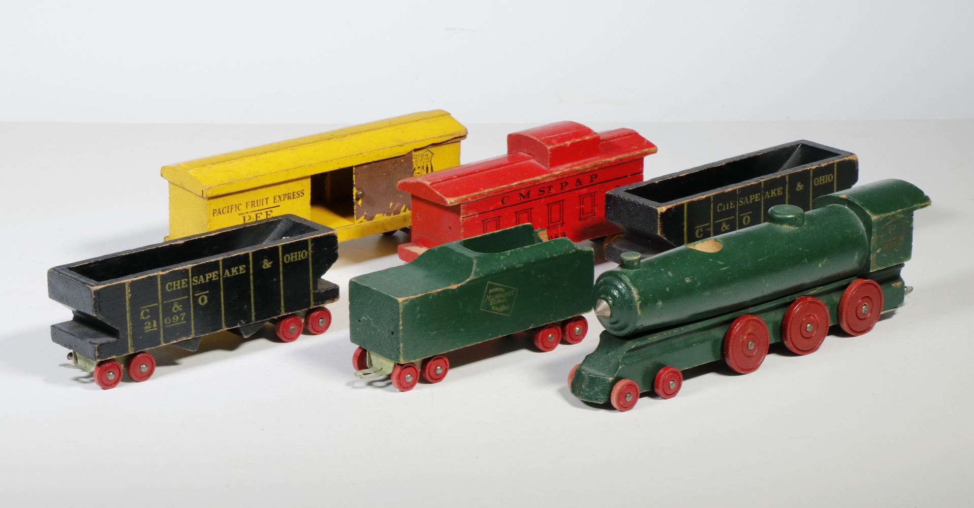 Appraisal: PC S WOODEN TOY TRAIN SET Locomotive with cars Chicago