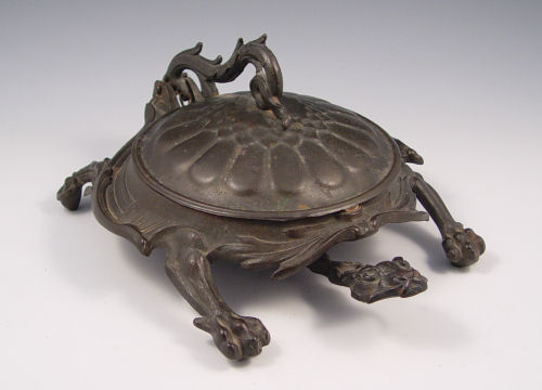 Appraisal: BRADLEY HUBBARD CAST IRON FIGURAL DRAGON TURTLE SPITTOON Lift top