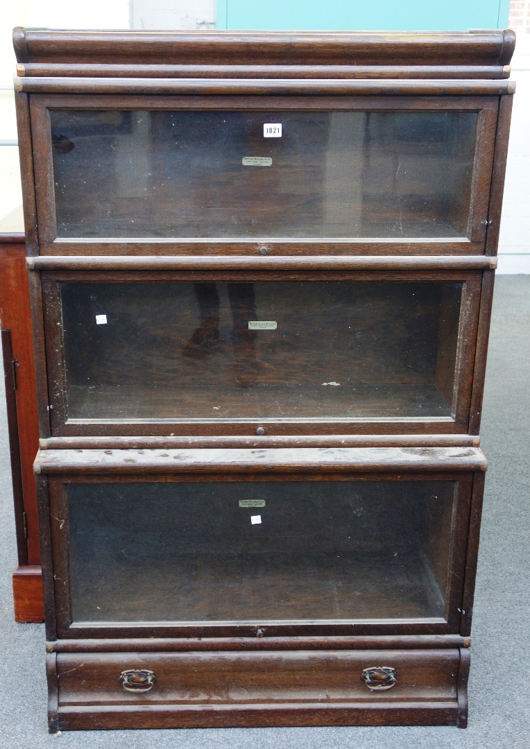 Appraisal: The Globe Wernicke Co Ltd' a three tier oak bookcase