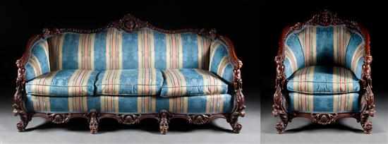 Appraisal: Rococo style carved mahogany upholstered sofa and matching occasional chair