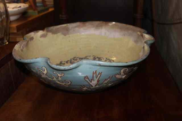 Appraisal: A LARGE BRANNAM TURQUOISE BASIN decorated with fish impressed marked